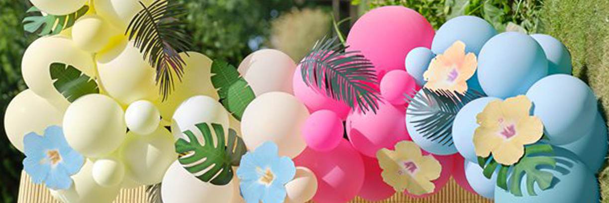 Hawaiian Tiki Balloon Arch with Tropical Flowers and Foliage